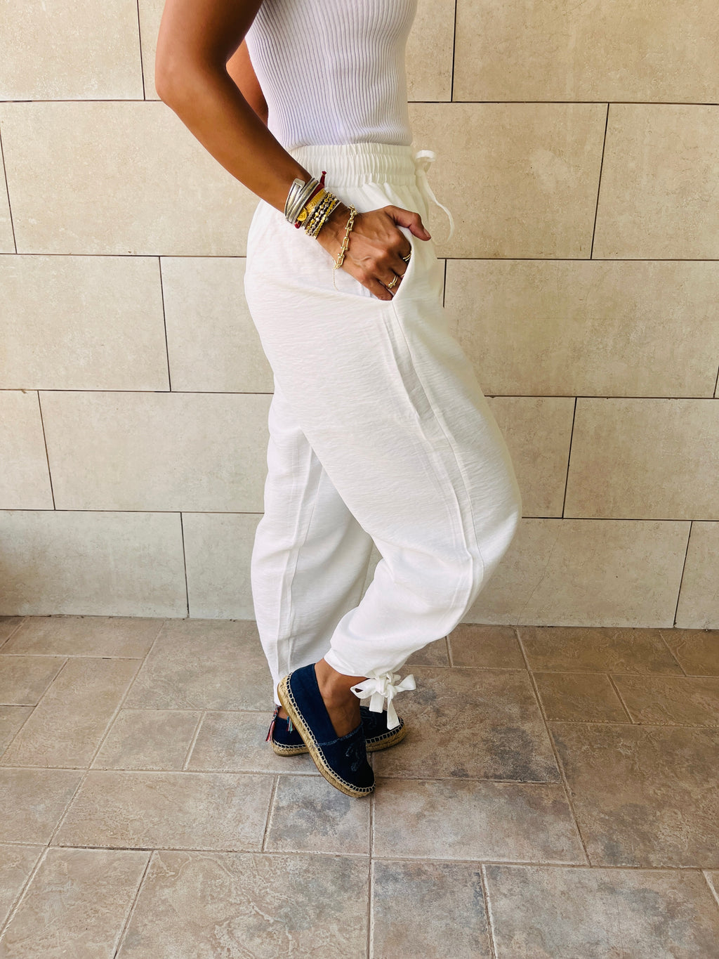 White Pulling My Leg Pants