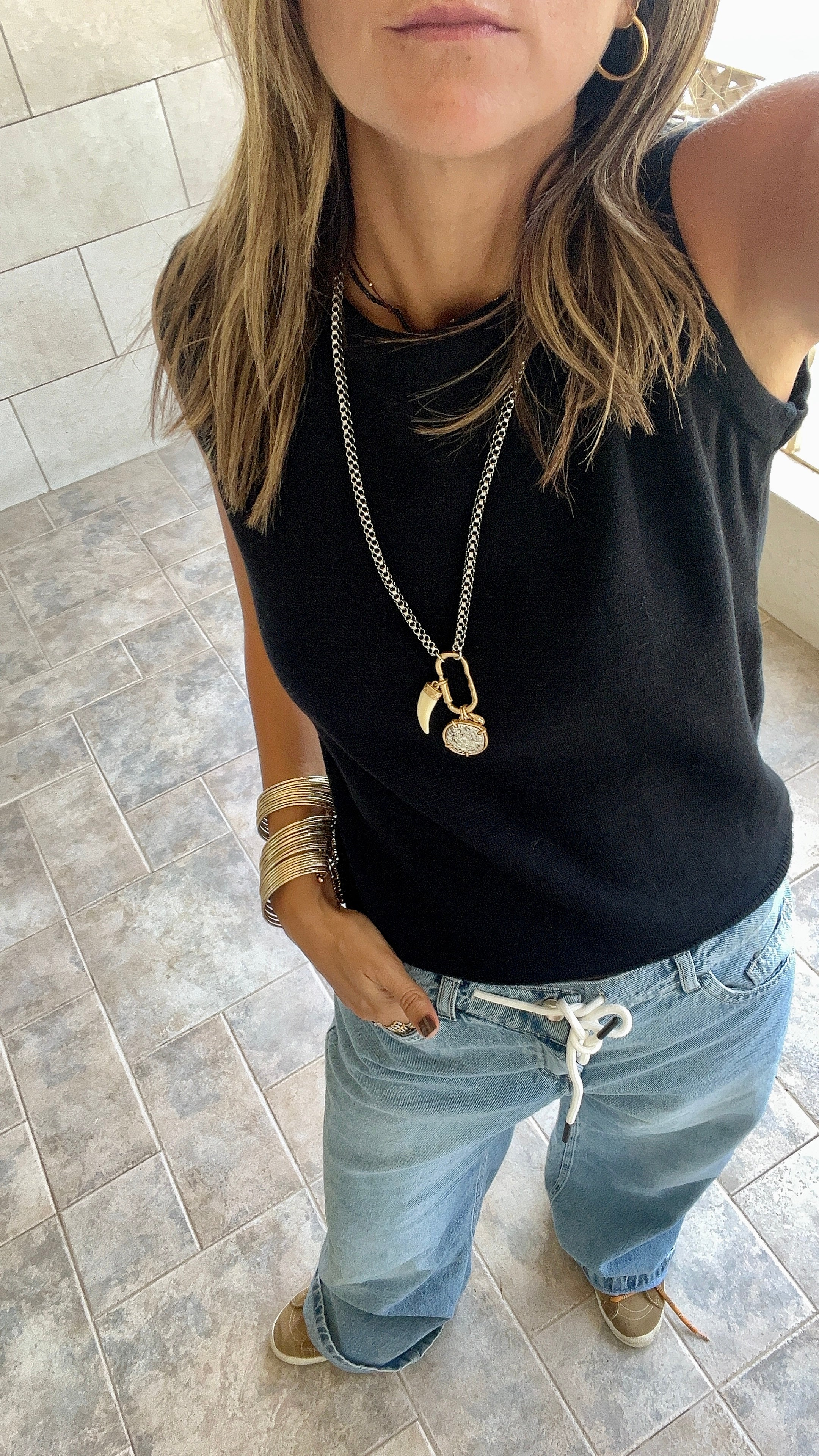 Black Sleeveless Crew Neck Knit Top