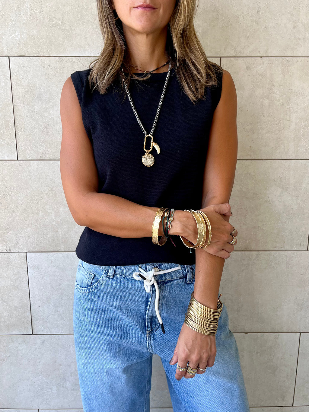 Black Sleeveless Crew Neck Knit Top